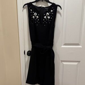 Chic Black Mini Dress with White Floral Accents